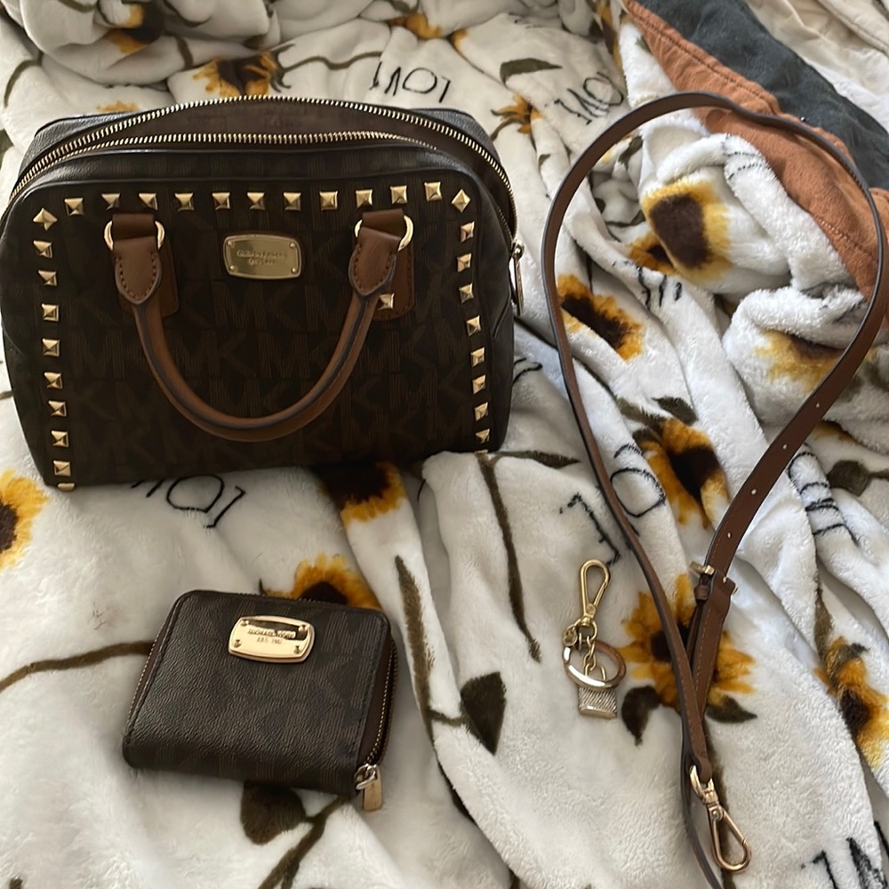 Michael Kors bag, wallet, keychain, and strap.